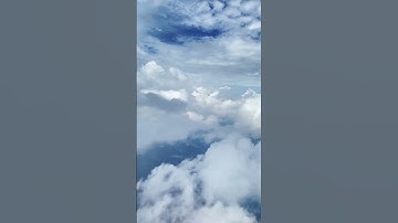 Flying through cool clouds over the Midwest on a Delta flight
