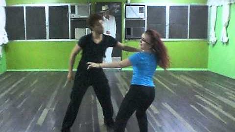 Cristi e Clinton fazem demonstração de zouk depois da aula