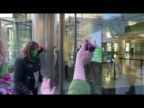 Climate activists smash windows at Barclays' London headquarters