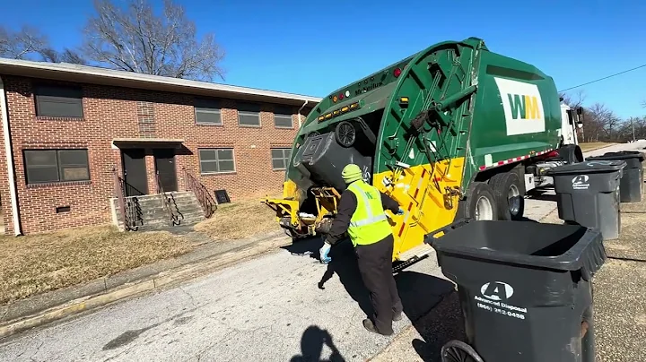 Waste Management Mack MRU McNeilus rearloader tackling Advanced disposal cart lines