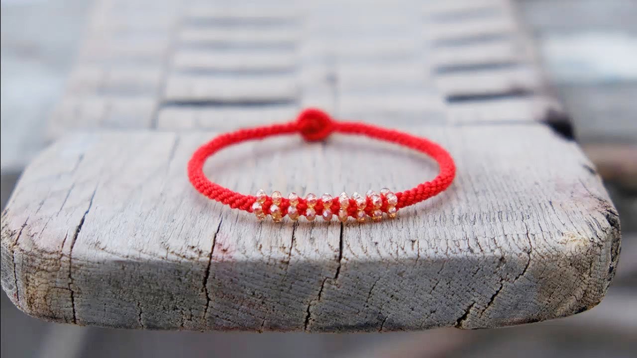 【编织】十字结编法之永恒 红色手绳 详细的教大家玉米结的编法 用了香槟色的车轮水晶珠 闪闪亮 很简单的一款手链 教你5分钟DIY手链接教程 车轮珠红绳
