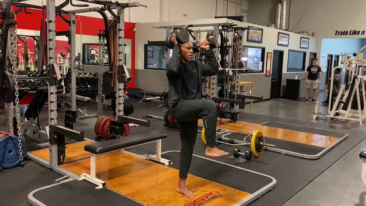 Single Leg Sprinter Knee Drive Overhead Eccentric Isometric Dumbbell