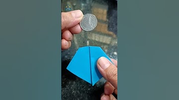 Can You Pass a Coin Through a Tiny Hole Without Tearing the Paper?