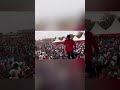 Da Agent performing for students in Kawempe