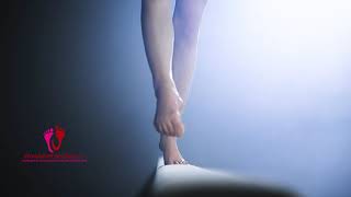 Gymnasts Pretty Bare Feet On A Balance Beam