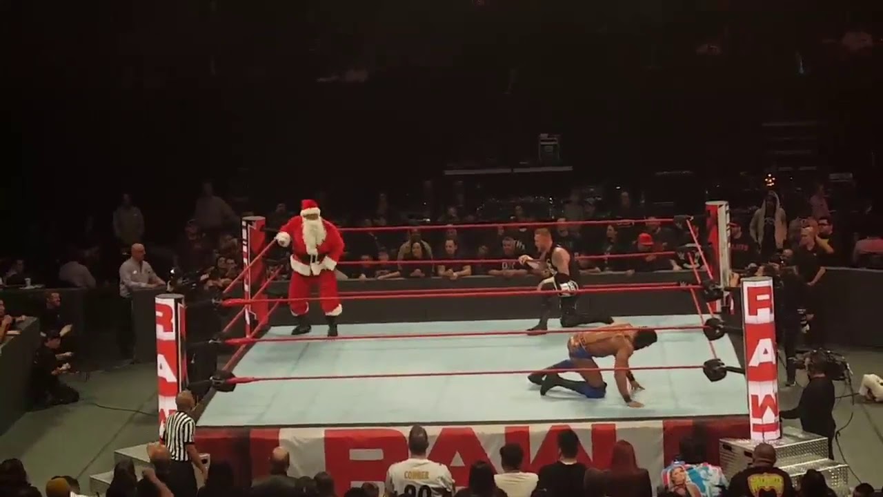 Rhyno returns as Santa Claus and saves Heath slater with a gore to Jinder MAHAL