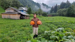 THE WOMAN LIVES ALONE IN THE MOUNTAINS. Cooking pumpkin porridge in the oven