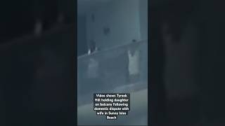 Video shows when Tyreek Hill held his daughter on a balcony following domestic dispute with wife.