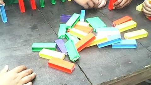 Filipino kids try uno stacko domino