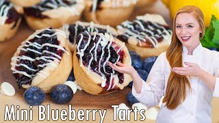Delicious Mini Blueberry Tarts - with white chocolate drizzle!!