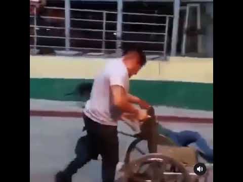 Guy trips on kid in a wheelchair