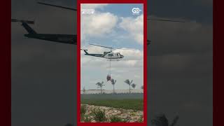Collier County Sheriff's Office helicopters retrieve water to fight brush fire