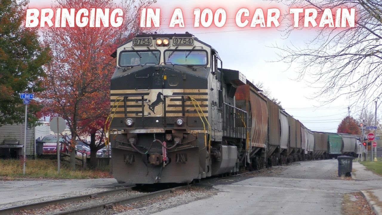 White face 9754 brings up the rear of a 100 car train over creaking