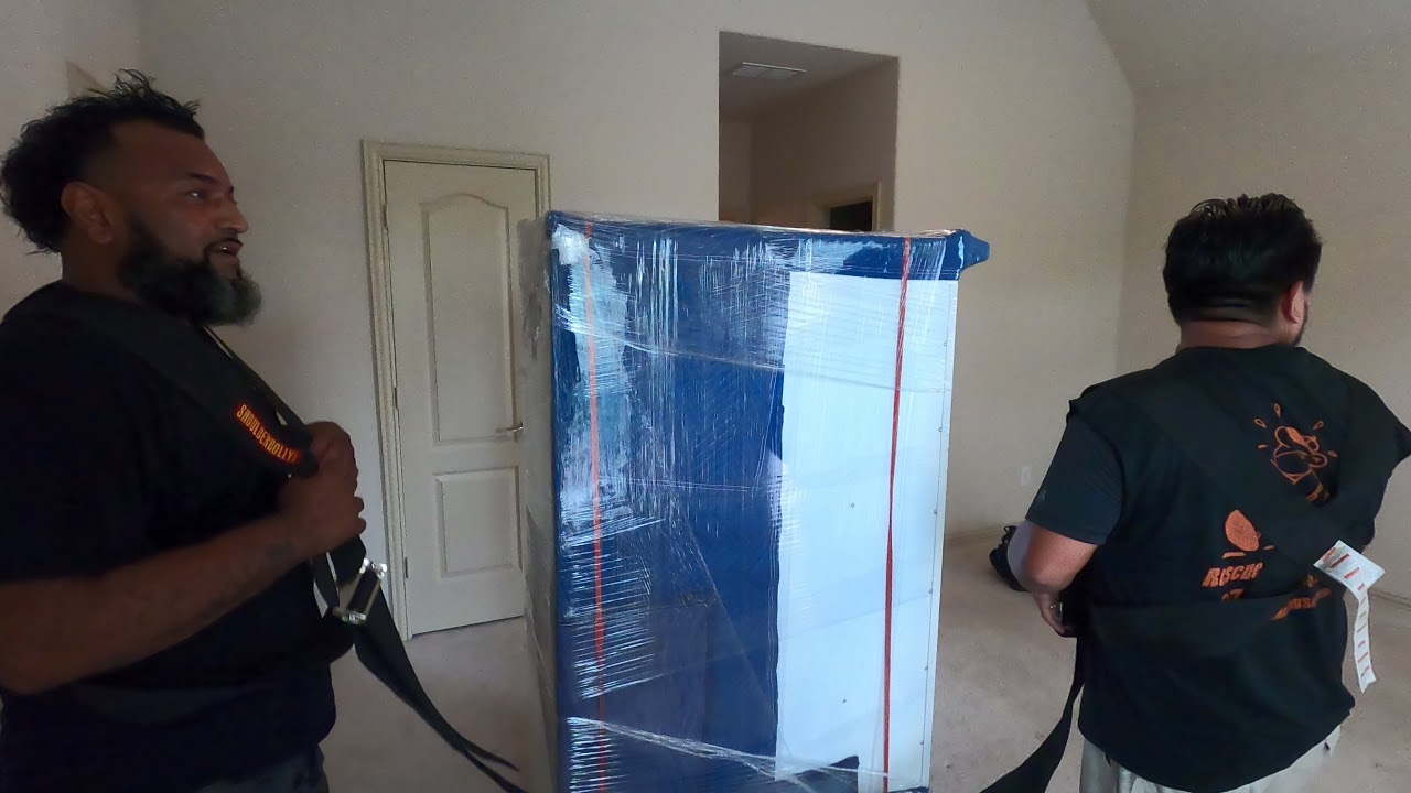 Moving Furniture Downstairs Using the Shoulder Straps by Rescue Moving