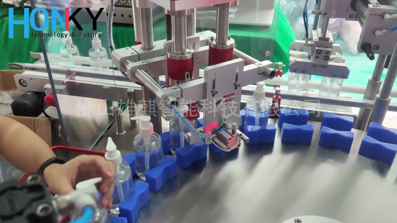 Rotary liquid/paste filling and capping machine - YouTube