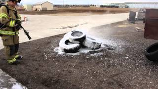 Macaw backpack putting out a tire fire in 20 seconds