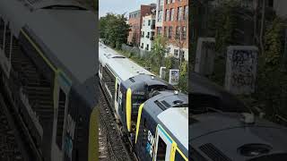 444015 and 444023 passes Wimbledon for London Waterloo