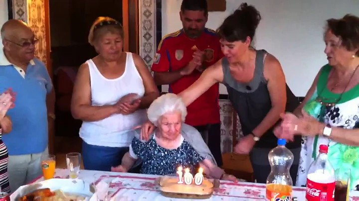 100th birthday blowing candles out