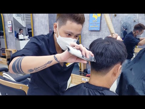Professional men's haircut at Queen Hair Salon Le Van Viet