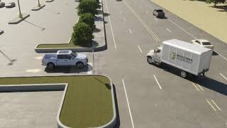 Box-truck driver tries, but misses, on tight turn into mall lot — Preventable or not? Profile