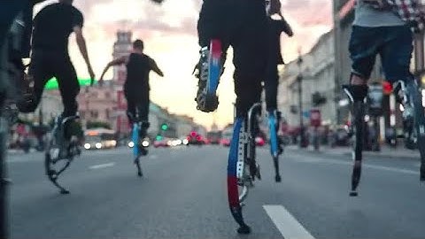 Runners With Jumping Stilts Stock Video