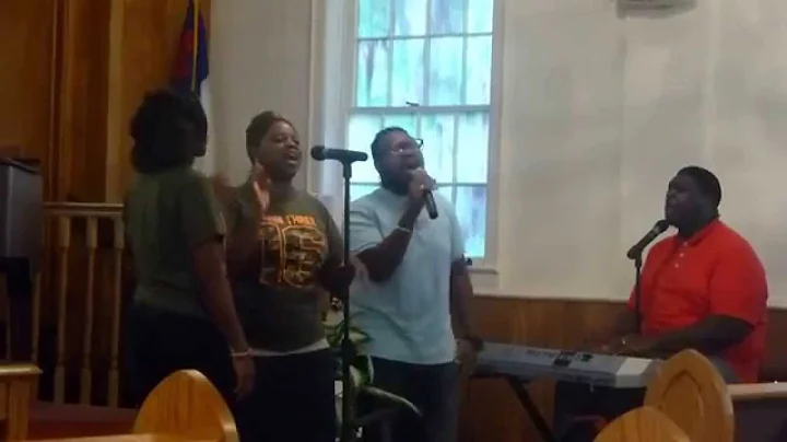 Jonathan Carmichael & family singing "How Great is...