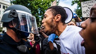 Demonstrators supporting black lives matter face off with california
highway patrol officers at the state capitol on saturday, may 30,
2020, over death o...