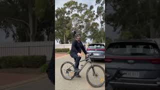Biker Wearing a Bird Figure on His Helmet Gets Surprised by an Actual Bird