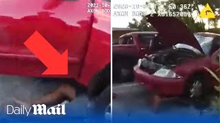 Dramatic Moment Police Save Man Being Crushed To Death Under Car