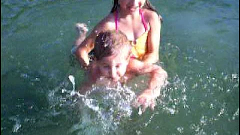 teaching little brother to swim