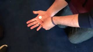 Disappearing 10 pence coin magic trick.