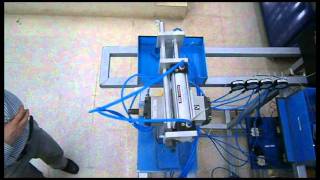 PLC controlled pneumatic arm for material handling.wmv