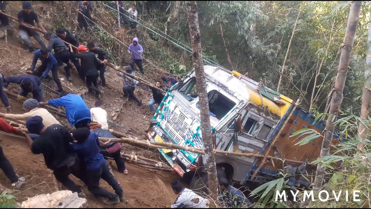 Kerala timber lorry fall down in to a kanal Timber lorry accident