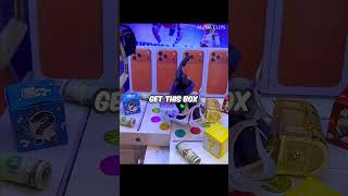 She won a real iPhone from a claw machine! 🤯✨