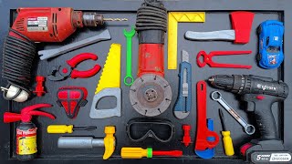 Collection of Repair Tools, Electric Drill, Electric Saw, Hammer With Wriench, Pliers, Hacksaw