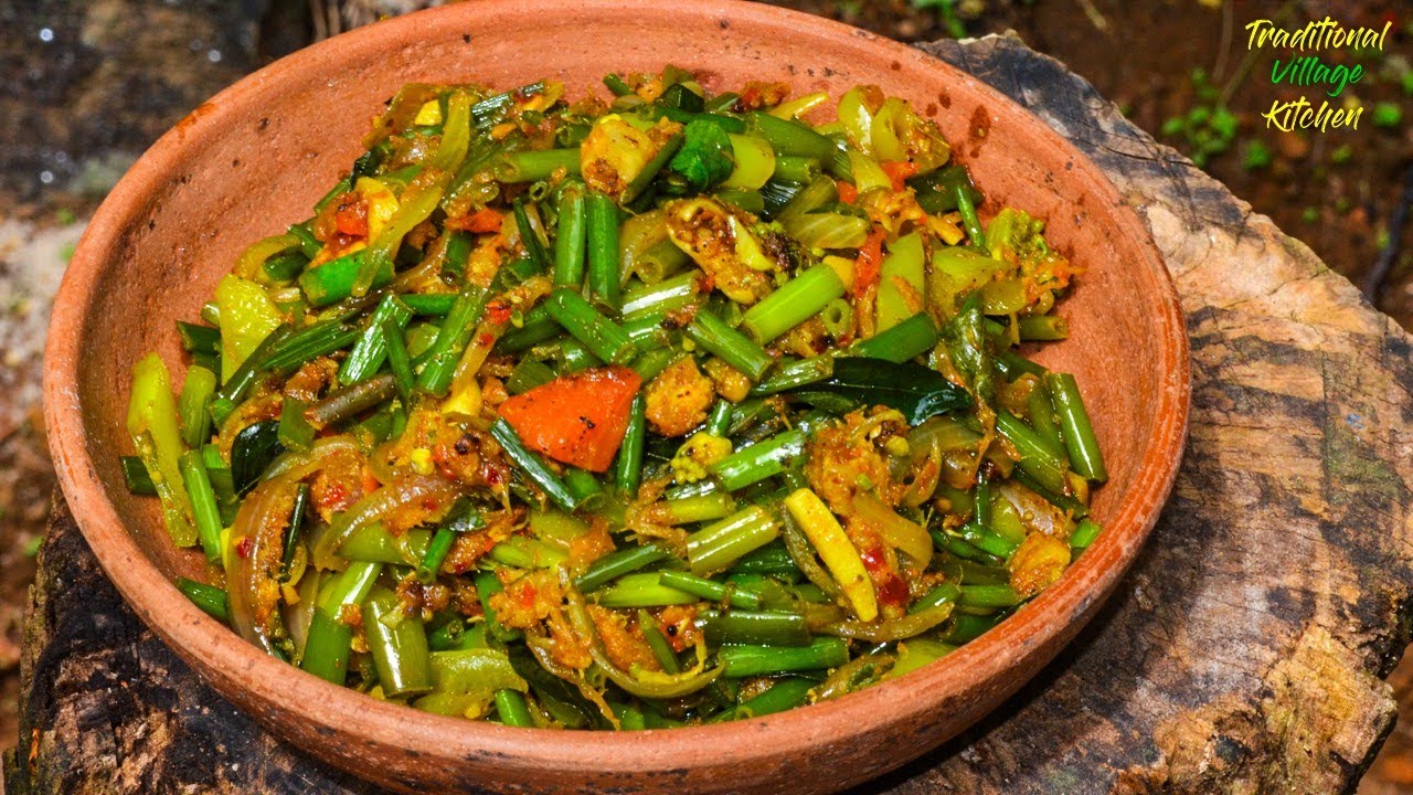 ගමේ රසට කරවල දාලා ළූණු මල් බැදුම Spring Onion flower Recipe Lunu Mal Themparaduwa YouTube
