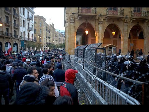 Lebanon security forces fire water cannons at protesters in second day of violent clashes - Lebanon security forces fire water cannons at protesters in second day of violent clashes