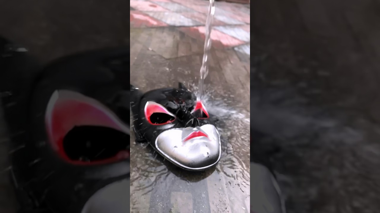 Catwoman mask water splash cinematic reveal slow motion 