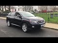 2012 Lexus 450h - Beige leather interior metallic black and chrome exterior.