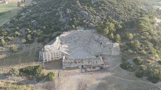 D-Log M. Gelemis, Turkey. Low angle aerial view of Patara Ancient Theatre against sky, monumental...