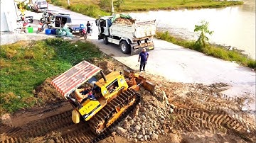 Start new project Dozer working push Land Filling Up with dump truck unloading Land.