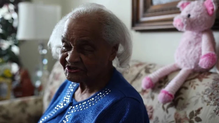 Flint resident sings her blessings after celebrati...