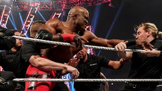 Bobby Lashley and Omos throw security guards out of the ring