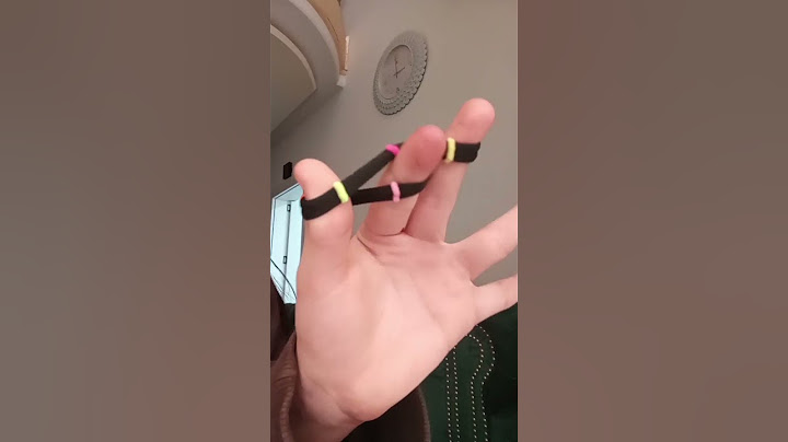 How to do the spinning rubber band trick😚#shorts#tutorial#trending