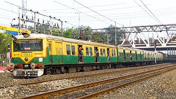 Single and double wind shielded old Electric Multiple Unit local trains made a smooth run