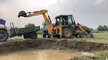 JCB Backhoe Loading on The River Mix Ballast Tractor