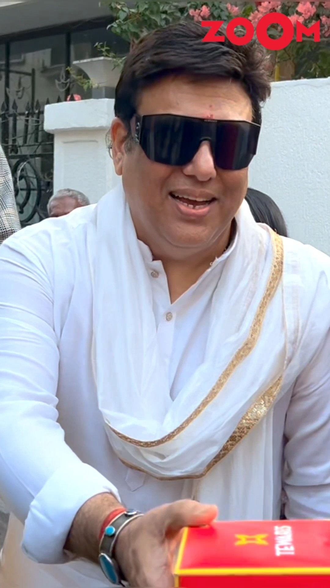 Govinda distributes sweets to the media outside his house #shorts #govinda #spotted