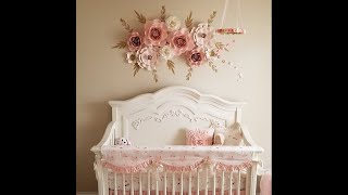 The évolur Aurora Collection is a set of beautiful, whimsical nursery furniture. It features curved headboards with applique, elegant 