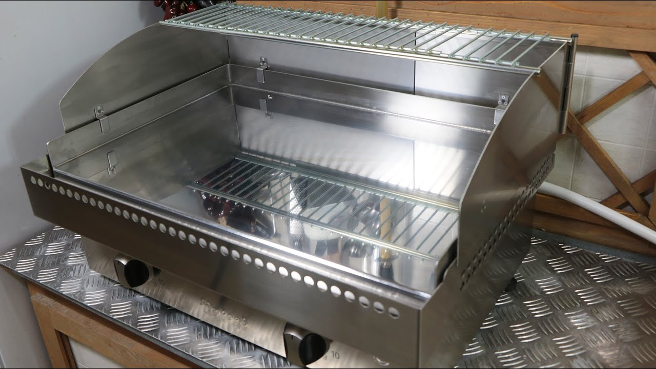 Présentation de la grille et protection anti éclaboussure pour plancha Simogas