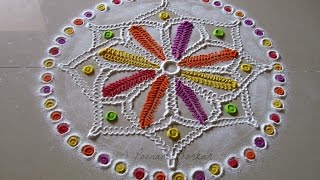 Small multicolored rangoli using cotton bud and betel nut |Easy Rangoli designs by Poonam Borkar